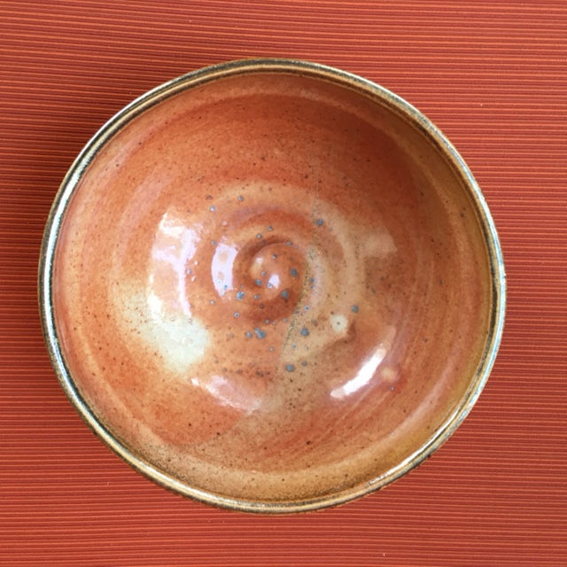 Medium orange glaze bowl, h2.5x6.25 inches