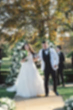 bride and groom walking down the aisle