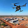 Drone monitoring a real estate construction
