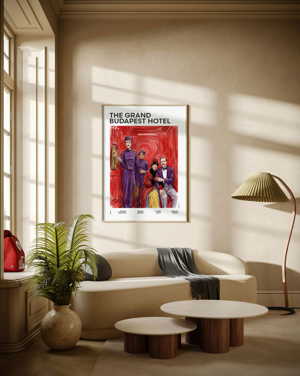 The Grand Budapest Hotel - Gustave illustrated mid-century movie poster displayed in modern living room with natural daylight