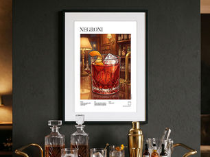 A stylish bar setup features a framed Negroni cocktail illustration recipe poster hanging on a dark wall, illuminated warmly by elegant wall sconces, complementing the display of decanters and cocktail shakers on the sideboard. Shop now!