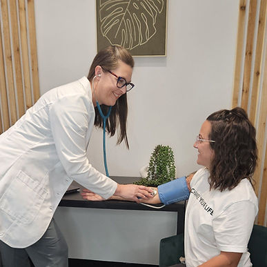 Katlyn w patient in white coat.jpg