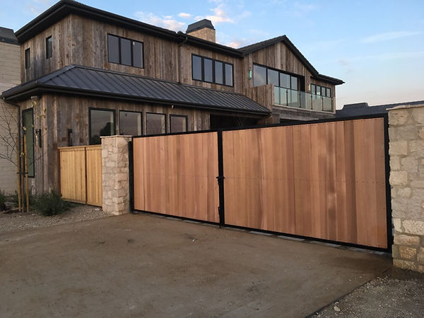 wood gate and panel in a steel frame