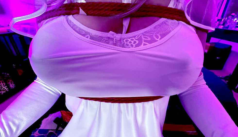 “It’s time for your holes to be dilated so that they’re ready to please the groom when he arrives,” announced Lady Phoenix as she fastened a leather harness with black shiny 8” dildo around her hips. Annabelle nodded keenly as her Mistress gestured to her to get on her knees in front of her. Lifting up the veil to show the sissy bride’s cute painted face, Lady Phoenix grinned proudly. “I think the groom is going to like what he sees from this angle,” she cackled evilly. Moments later, the big black dildo was thrust into Annabelle’s virgin mouth as she grappled with pleasuring the phallus while struggling not to choke. It was an art that simply had to be leaned before the wedding night! To be fair to the bride, her sucking technique improved with every thrust until her blow-job skills were wedding night ready.