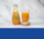 Bouteille de jus local et un verre.