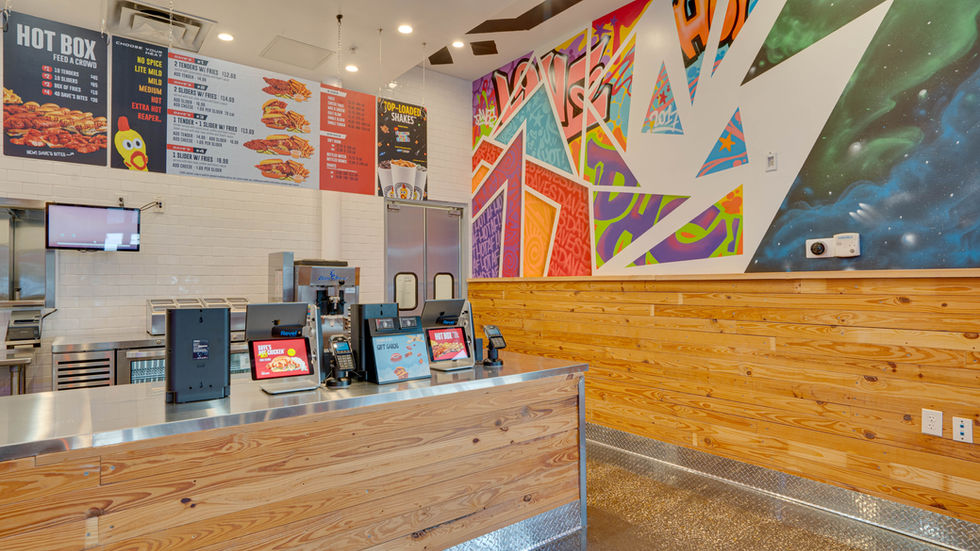 Nice urban graffiti filled register line at Daves Hot Chicken