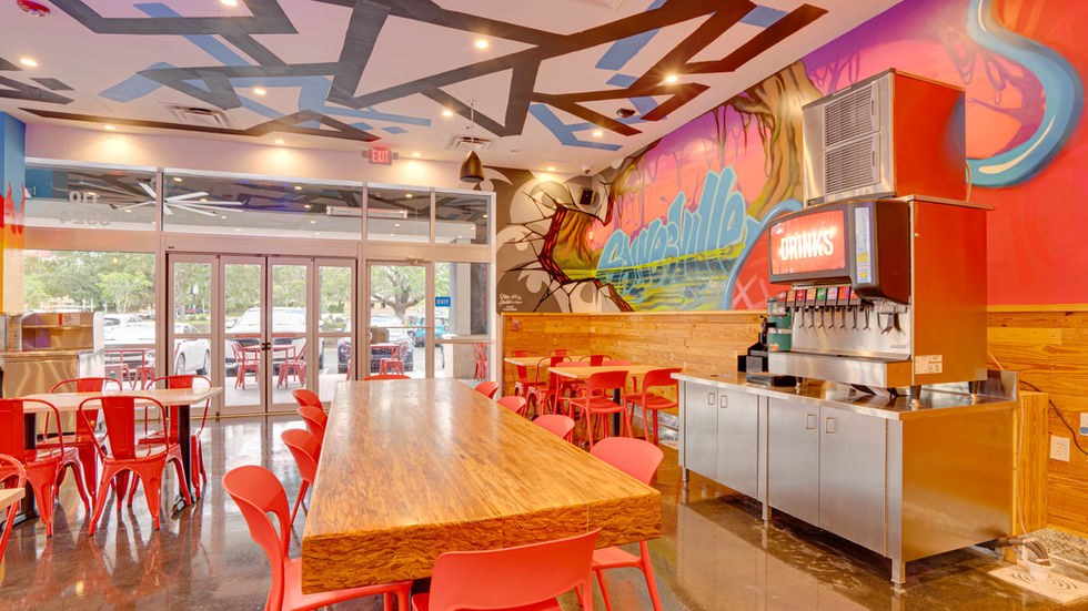 Soda Fountain with Gainesville graffiti on the wall at Daves Hot Chicken
