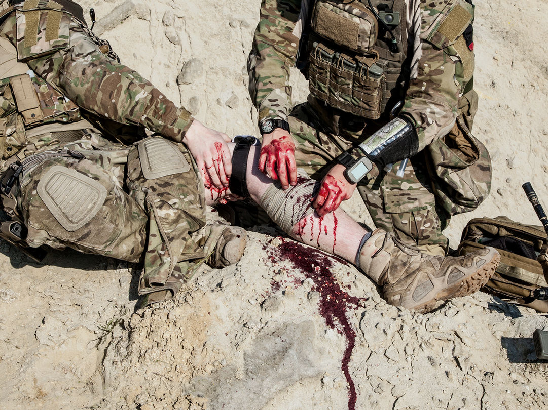 Special forces medic treating