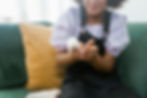 person holding white sugar glider