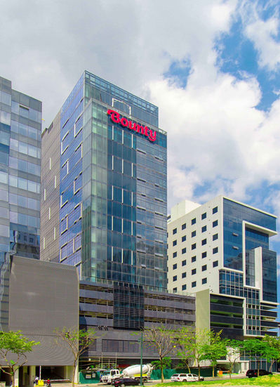 Inoza Tower in Taguig City showcases a contemporary architectural design with a focus on functionality and aesthetics. This image highlights the building's sleek glass facade and its prominent presence in the urban landscape. The design reflects a contemporary interpretation of Philippine architectural principles, creating a visually striking and functional commercial space.