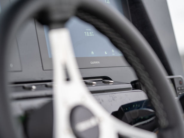 Boat steering wheel and navigation screen