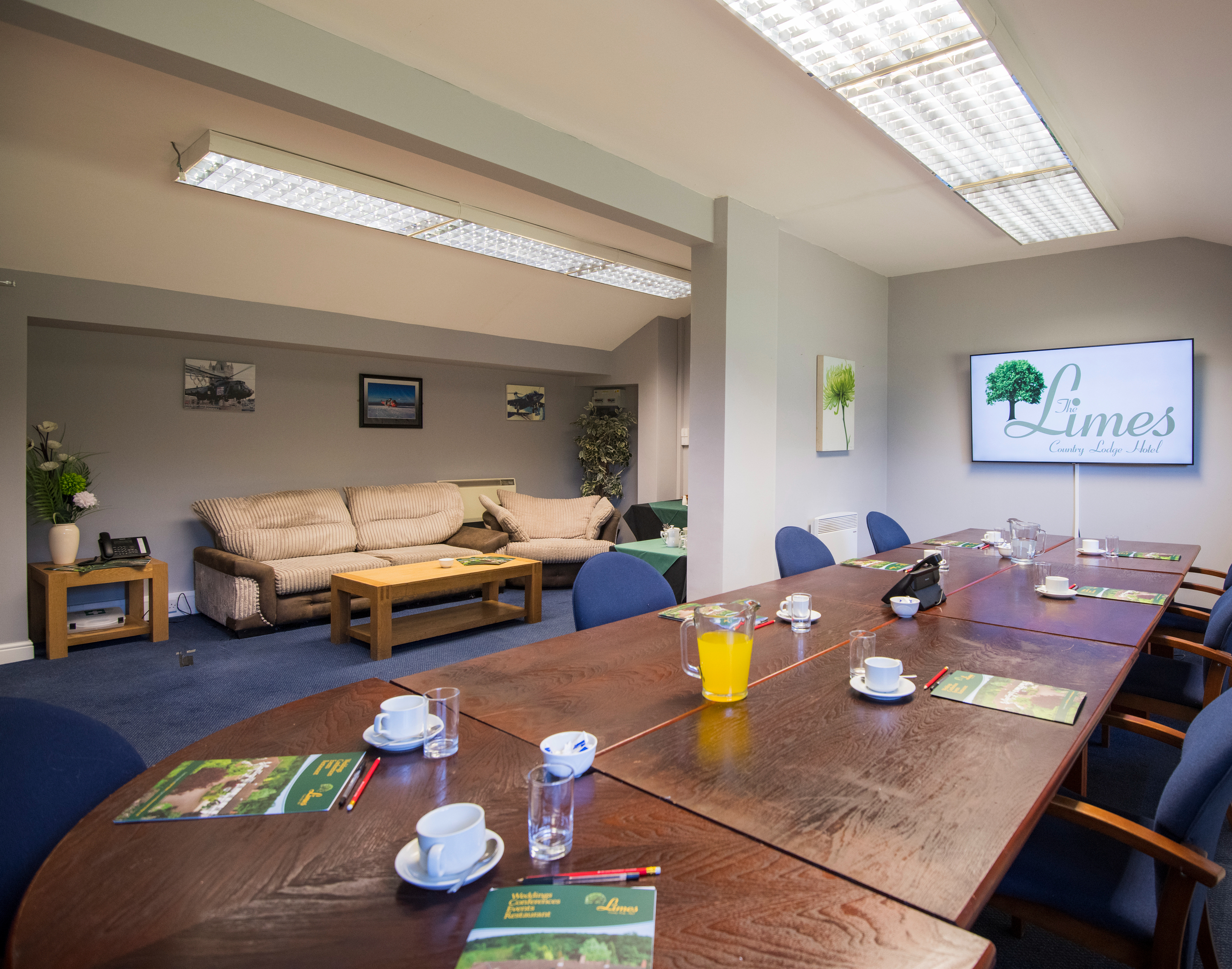 Meeting room with table, chairs, and lounge area