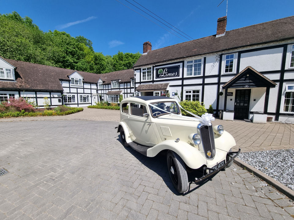 Vintage car parked at The Limes, wedding venue