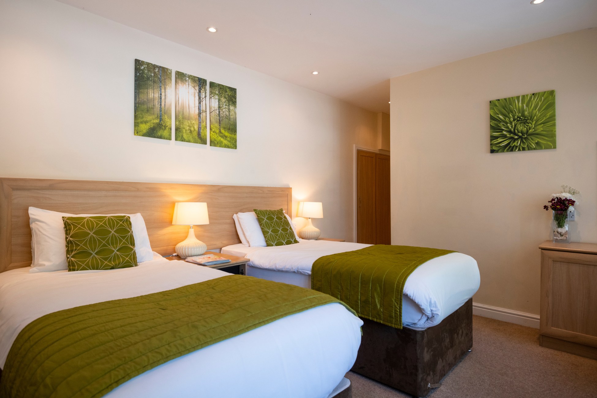 Twin beds in a tranquil hotel room