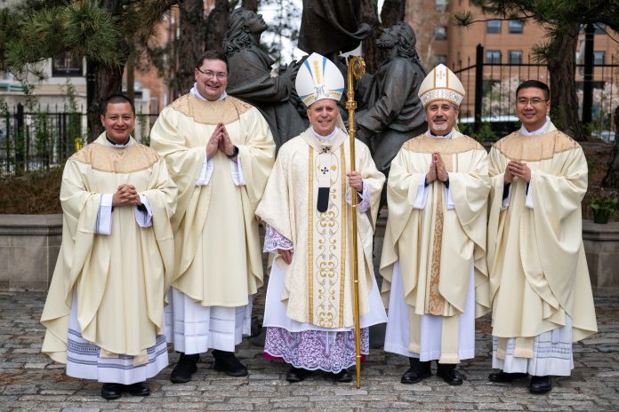 From L-R, Fr. Patricio Chuquimarca, Fr. Kevin Kasel, Archbishop Samuel Aquila, Bishop Jorge Rodriguez and Fr. Anthony Phan pose for a photo after a priest ordination at the Cathedral Basilica of the Immaculate Conception last weekend. (Photo by Daniel Petty/Denver Catholic)