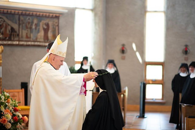 Archbishop Samuel J. Aquila celebrated the solemn profession Mass of Sister Assunta of the Abbey of St. Walburga on July 22, 2023, in Virginia Dale, Colo. (Photo by Ellie Lempe)