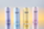 Four pastel-colored cans of "TRIP Mindful Blend" drinks in purple, blue, yellow, and pink against a gradient background.