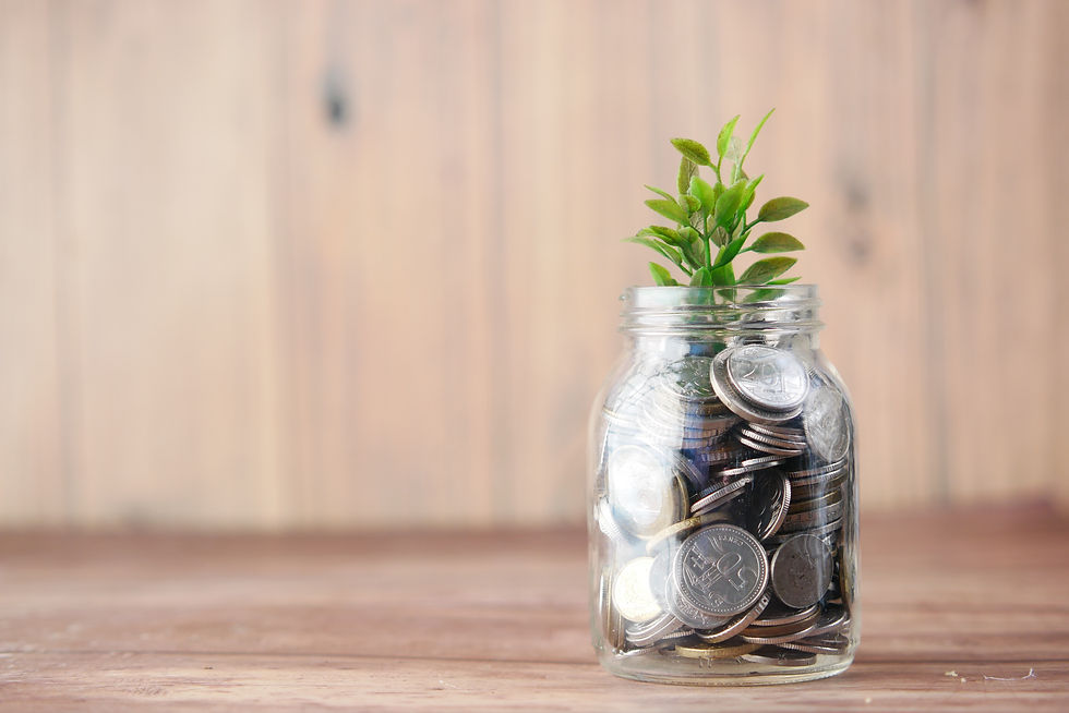 Jar with coins in it and a plant growing out, symbolizing saving money and growing your wealth.