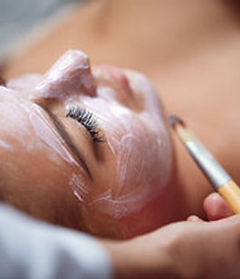 Beautiful young woman having a facial cosmetic treatment_.jpg