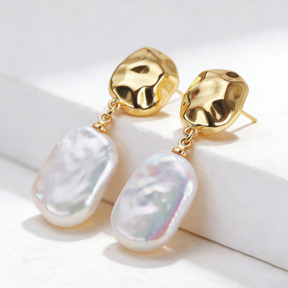 Thumbnail: Hammered gold and baroque pearl drop earrings