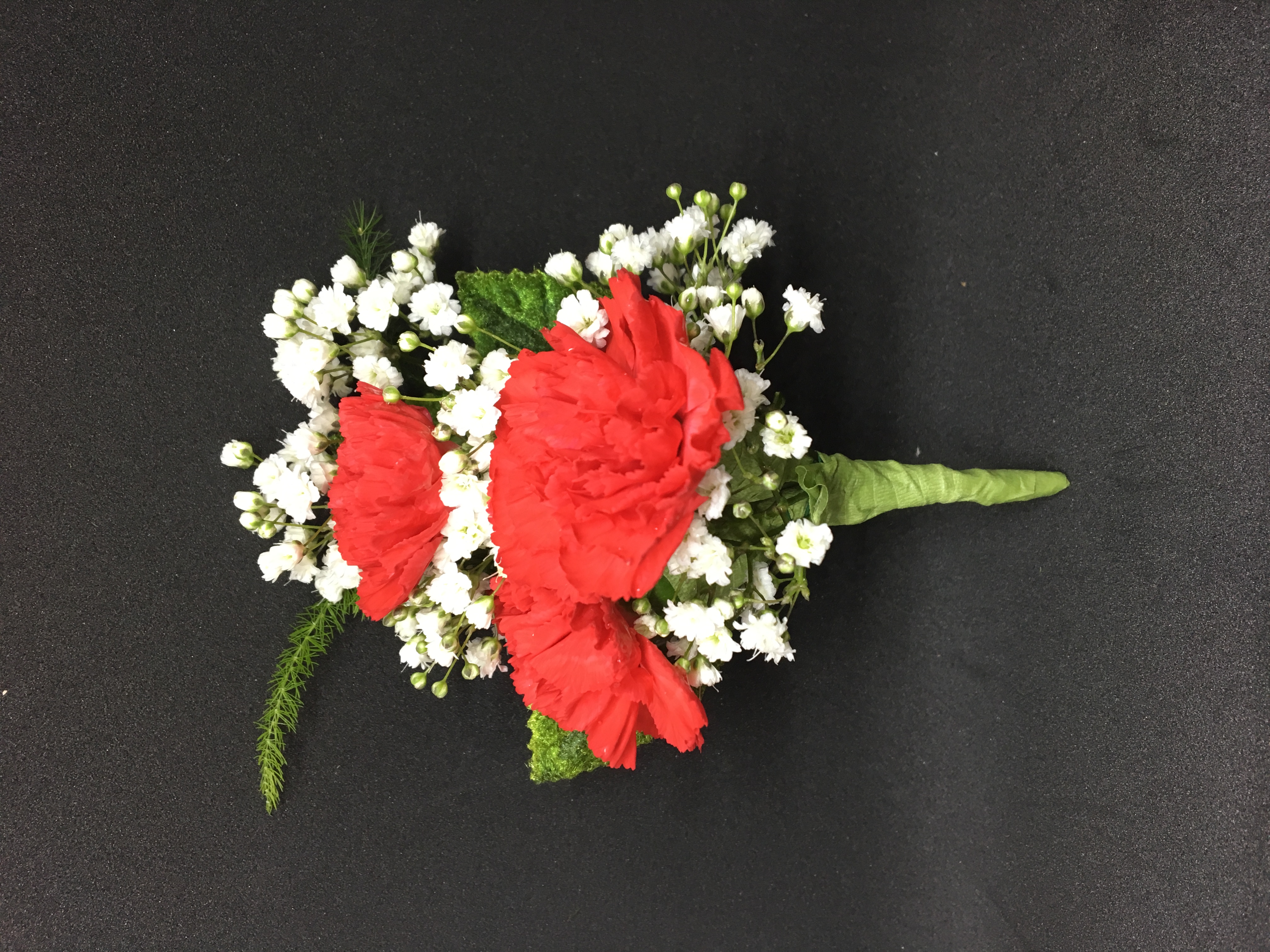 3 red minicarnation boutonniere