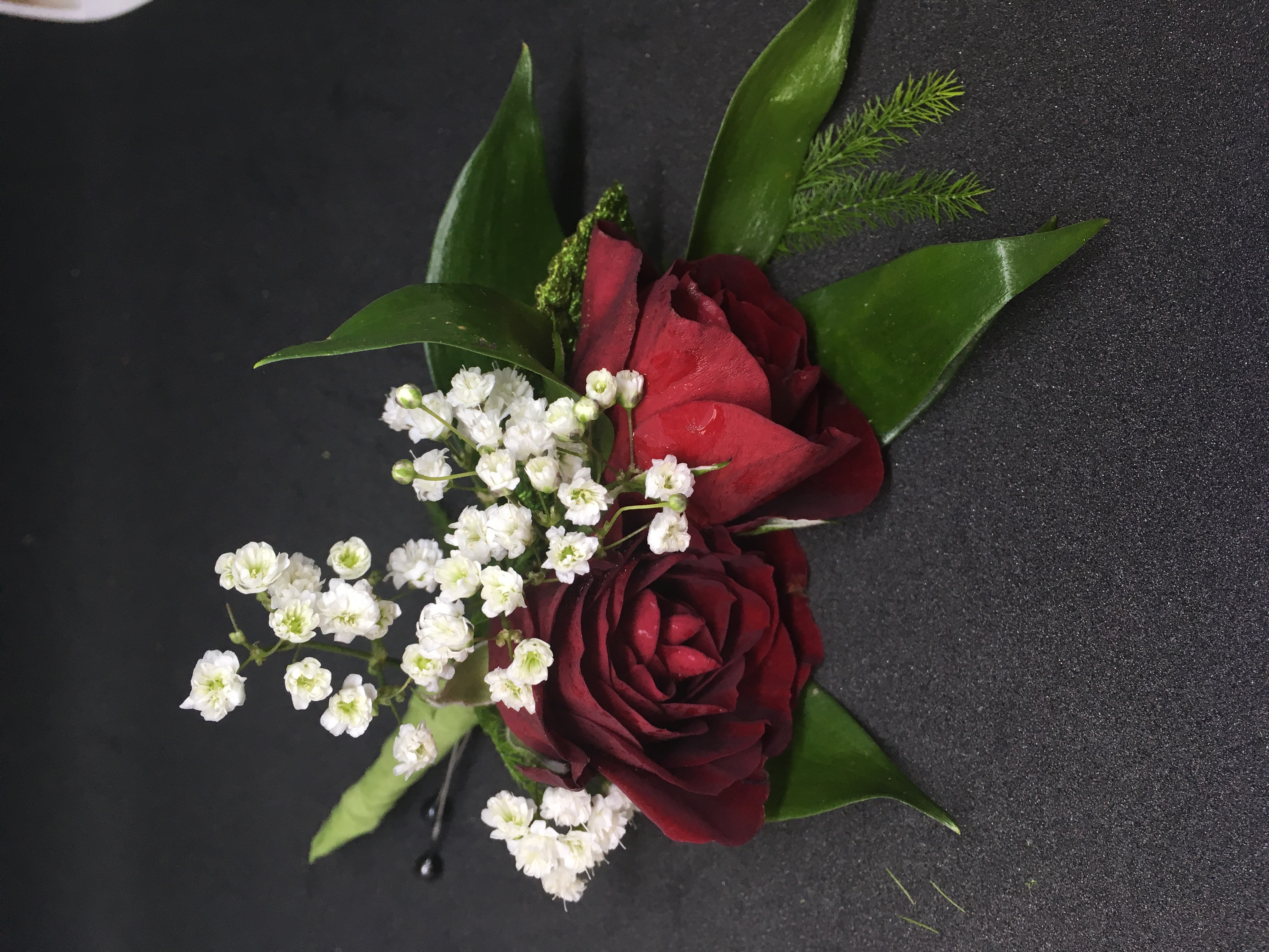 Red spray rose boutonniere