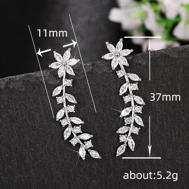 Thumbnail: Leaf & Vine Rhinestone Drop Earrings - White Gold or Gold