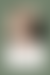 Therapist sitting with a client in session representing the emotional experience of a therapy intensive.