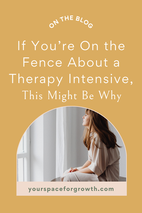 Woman sitting by a window reflecting, representing uncertainty about booking a therapy intensive.
