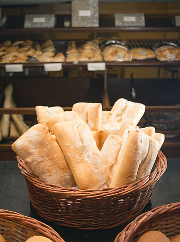 vertical-shot-pieces-bread-basket-shop.jpg