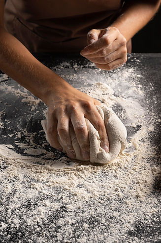 chef-covering-dough-flour-make-it-less-sticky.jpg