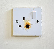 Damaged electric socket.jpg