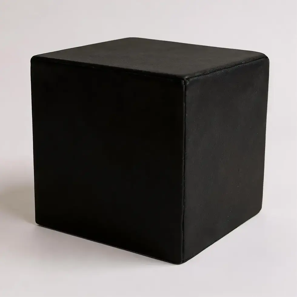 Sleek black cube ottoman with a smooth, upholstered finish and minimalist design.
