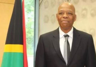 'n Ambassadeur dros uit 'n Brusselse vergadering