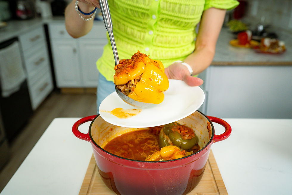Homemade stuffed peppers with beef and rice in tomato sauce