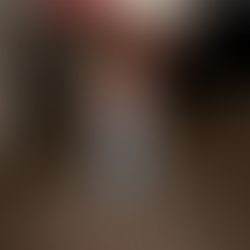 Romantic lingerie inspired Valentine's Day outfit featuring a structured corset top paired with loose-fitting jeans and feminine styling