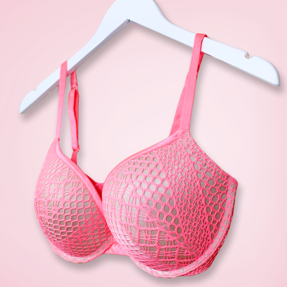 Front right angle showing satin trim and coral fishnet overlay of Victoria's Secret Push-Up bra