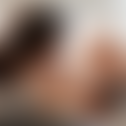 Mother breastfeeding her baby, showing natural postpartum body changes after pregnancy and breastfeeding