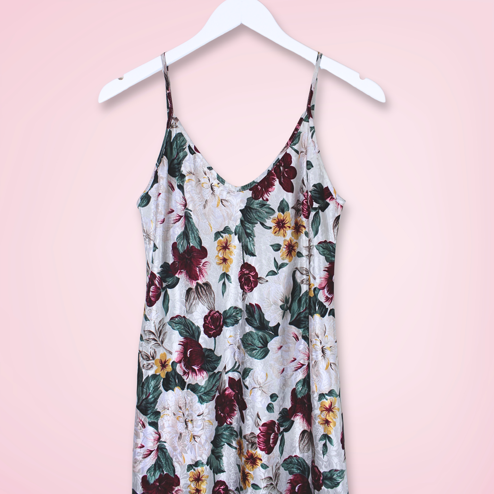 Vintage L.A. Intimates floral satin slip dress in white with red, green and yellow flowers, front view close up