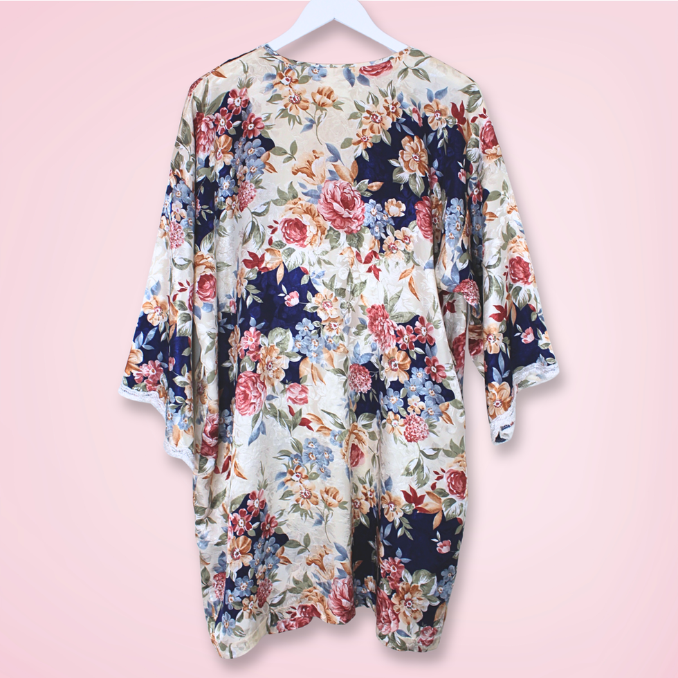 Back view of vintage L.A. Intimates floral robe showing colorful floral print and loose silhouette