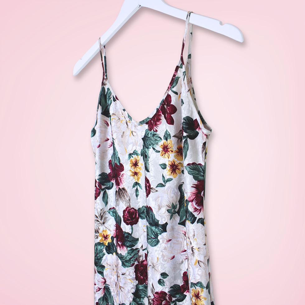 Right front view close up of vintage L.A. Intimates floral slip dress with colorful floral print and V-neckline