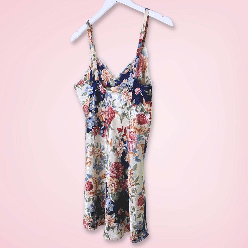Back left view of vintage L.A. Intimates floral slip showing the dress silhouette