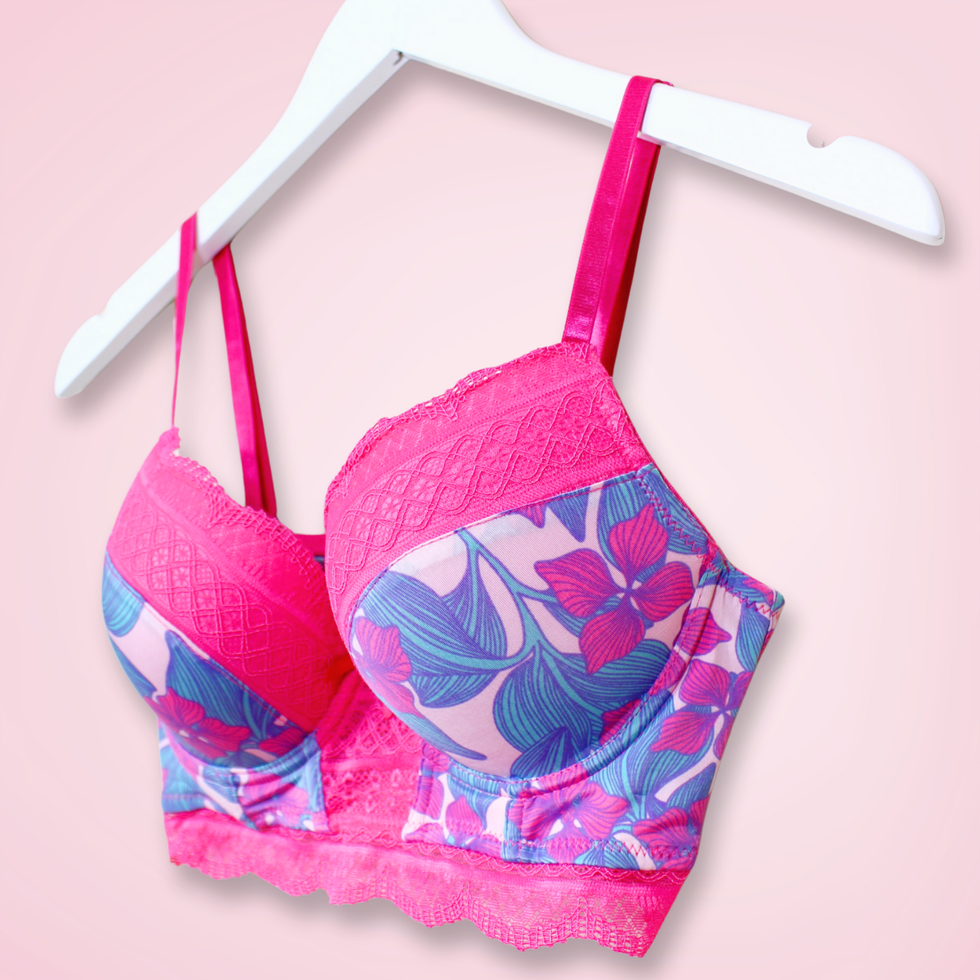 Right angled view of push-up bra, highlighting tropical pattern and longline silhouette