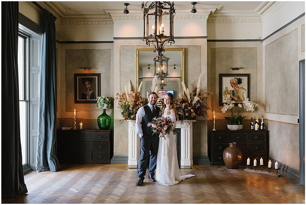 An intimate wedding at luxury wedding venue No131 Cheltenham with pampas grass decor and Autumn weddings