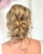 textured mid curly bun