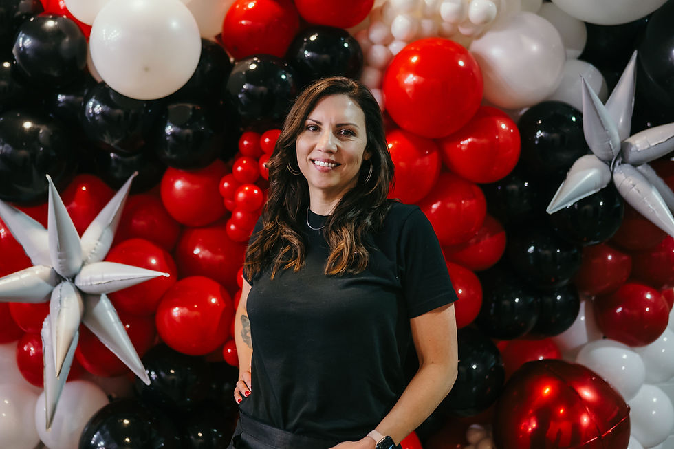 Liz Stone, owner and balloon designer of Pop & Flair