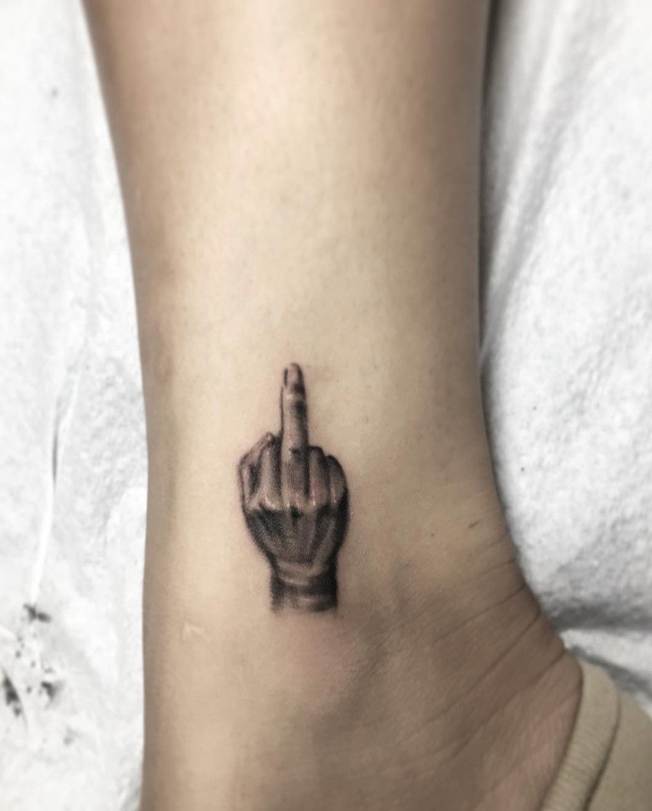 Middle Finger Tattoos That Speak Volumes