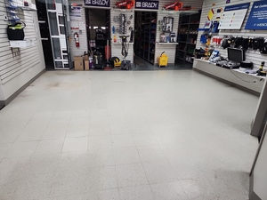 an empty store with a brady sign on the wall