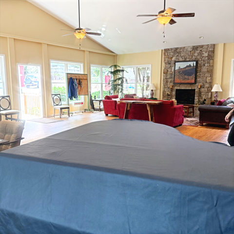 Spacious front room with grand piano