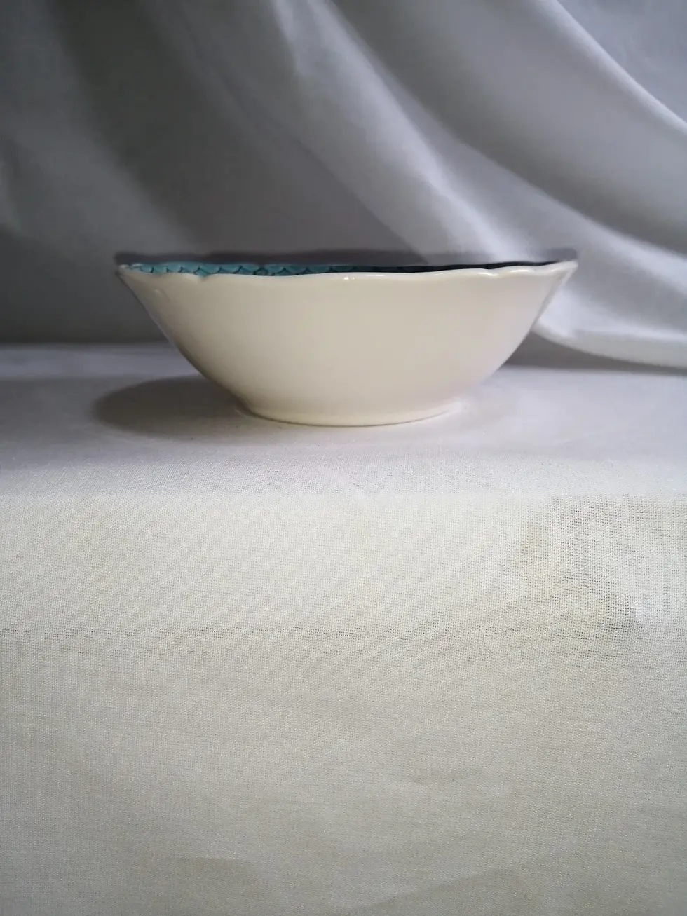 Side view of the Royal Doulton Lowerstoft Bouquet dessert bowl